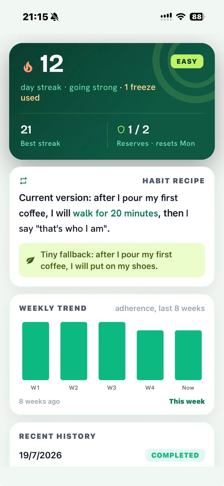 Streak display showing current streak (12 days), longest streak (21 days), and reserve indicator (1 of 2 remaining)
